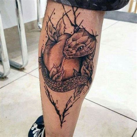 If you have tall and thin legs and want to show off with a get this tattoo design. Snake apple leg tattoo | Nature tattoos, Tattoos for guys ...