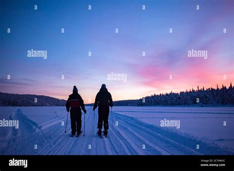 Skiing On The Frozen Lake At Torassieppi At Sunset Lapland Finland