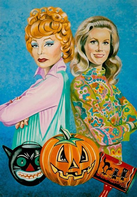 Two Women Standing Next To Each Other With Pumpkins And Cats In Front