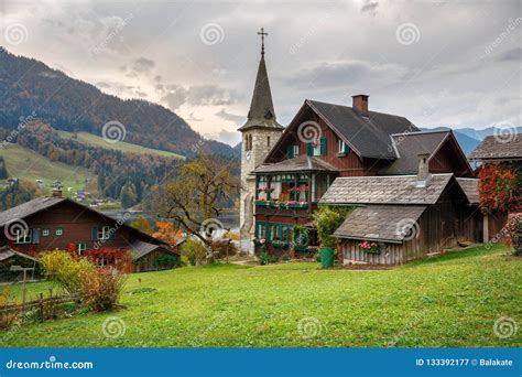 Traditional Wooden Residential Houses On The Shore Of Lake Grundlsee On