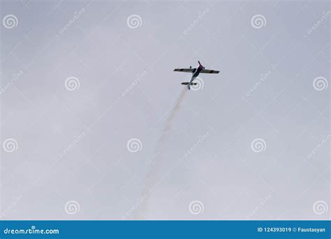 Yak 52 Aircraft In The Sky Performs The Program At The Air Show