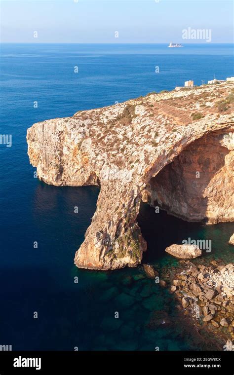 Blue Grotto Malta Vertical Coastal Landscape With Natural Stone Arch