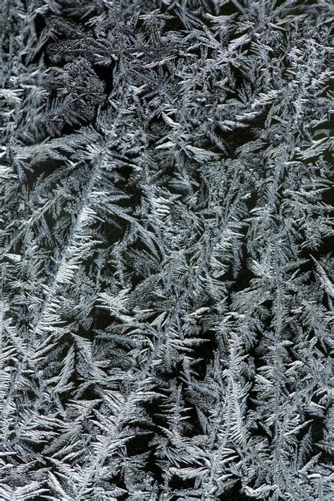 Ice Crystals Of Frost On A Window In Rangeley Maine Stock Photo