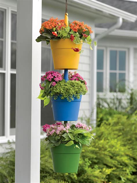 The petals are designed to open like an umbrella to shelter pedestrians from harsh sun or chilled rain. Plant Pots: Cascading Hanging Flower Pots | Gardeners.com