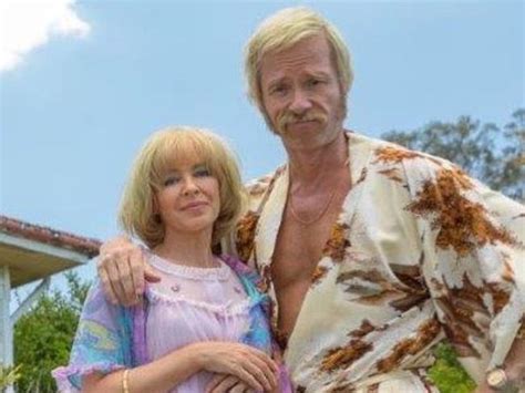 Three and a half stars. Swinging Safari movie review: Kylie Minogue and Guy Pearce ...