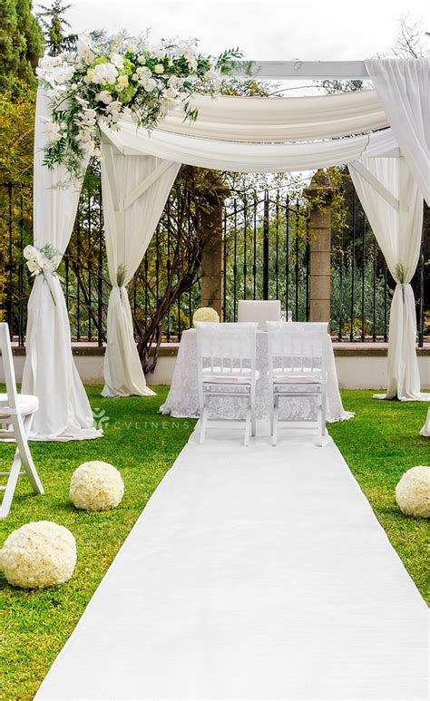 Wedding canopy chuppah or huppah. White outdoor elaborate wedding ceremony canopy set up ...