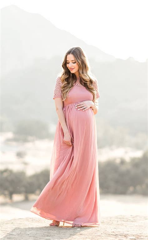 A Flowy Pink Maternity Maxi Dress Cute Maternity Dresses Stylish Maternity Maternity Gowns