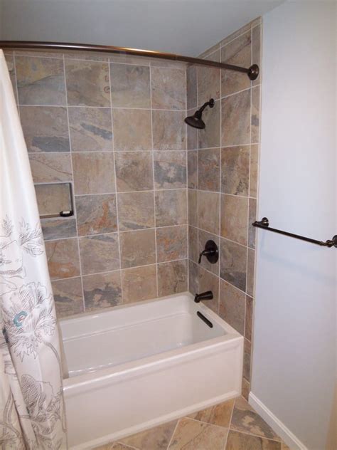 Typically made of tile, bathtub surrounds prevent water from damaging the wallboard around the tub. tiled tub surround | Yelp