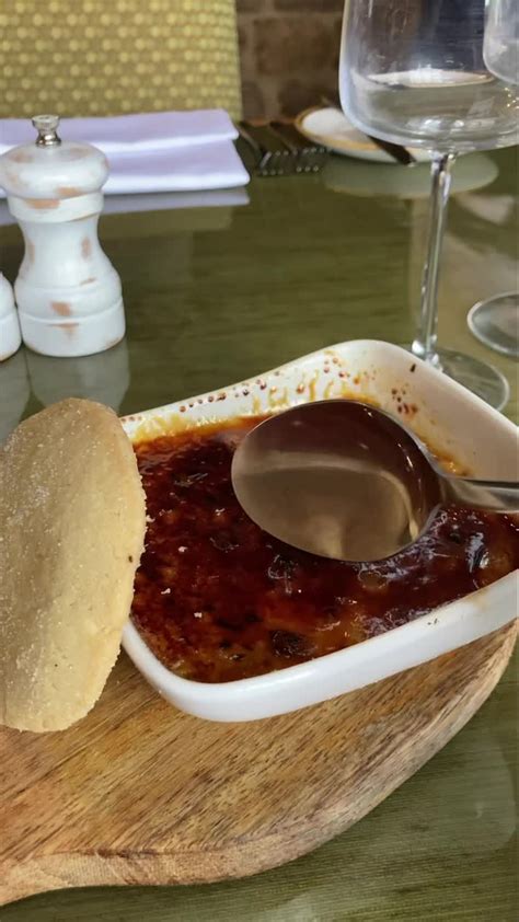 A Snapshot Of Our Delicious Homemade Lavender Creme Brûlée With A Shortbread Biscuit A Definite