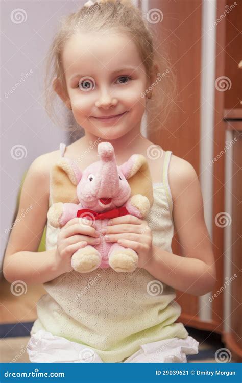 Portrait Of Happy Little Girl Holding Toy Stock Image Image 29039621