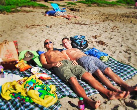 Taylors Sun Tanning At Beach In Orange County Traveldads
