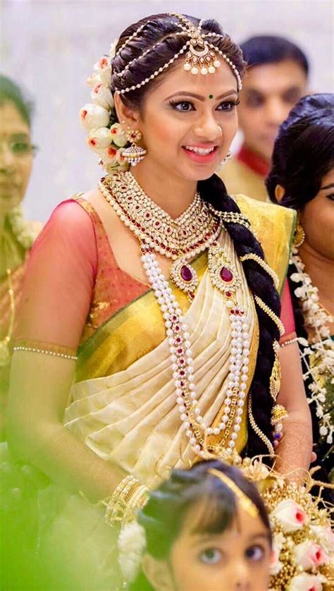 15 Kerala Wedding Sarees And Blouse Designs Indian Bridal Hairstyles Indian Bridal South