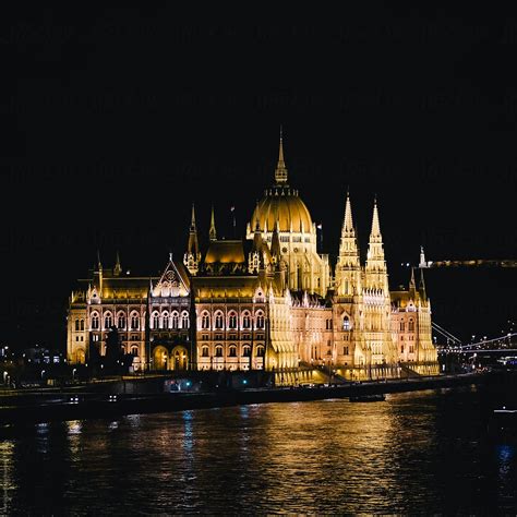 Hungarian Parliament Building At Night Budapest By Stocksy