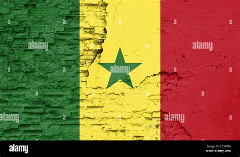 Senegal Flag Is Painted Onto An Old Brick Wall Stock Photo Alamy