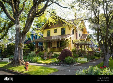 Classic American Suburban House In Springtime Neighborhood Setting