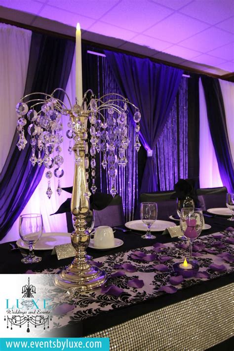 Sparkly silver glitter on flowers, cards, centerpieces, gift wrap, and balloons are a great touch to any gift set. Purple and black wedding backdrop, Purple black and white ...