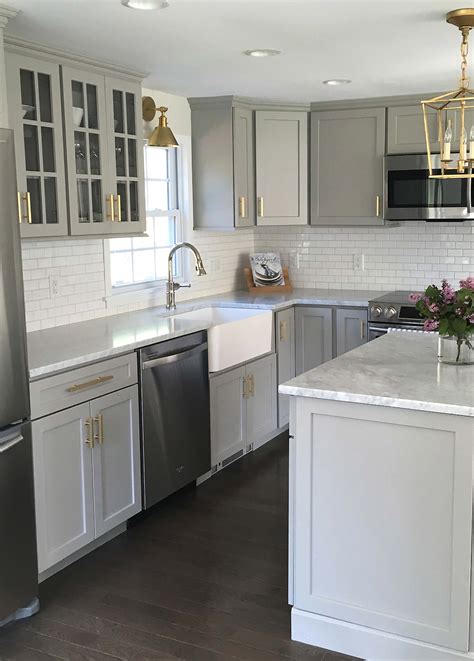 Design styles and layout options 101 photos. We love this stylish gray kitchen with #goldhardware ...
