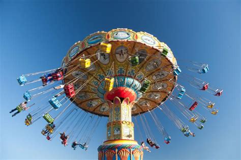 Swing Rides At The Amusement Park Traditional Swing At Amusement Park