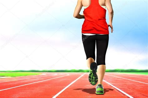 Women Jogging On Running Tracks — Stock Photo © Razihusin 57716515