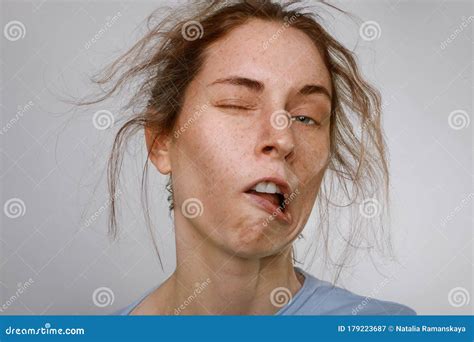 Headshot Of Young Woman With Brown Messy Hair Sleepy Concept Close Up