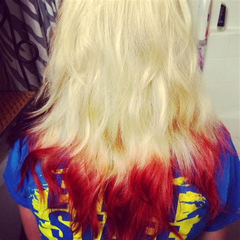 Use aluminum foil underneath the hair to keep things clean and protected. Blonde with red tips | Red hair tips, Blonde hair with red ...