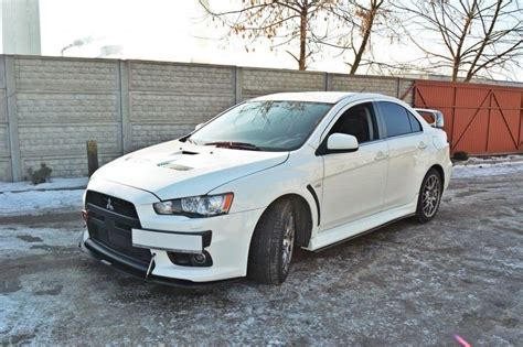There is a small dent is the lower front passenger side bumper. RACING SIDE SKIRTS DIFFUSERS Mitsubishi Lancer Evo X | Our ...