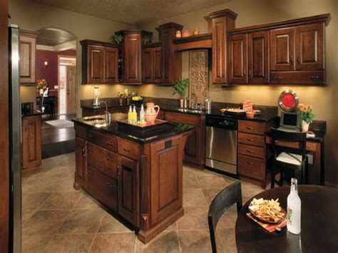 Unlike the soft colors for painted kitchen cabinets, the trend for wood cabinets is to stain with a rich, dark color. 21 Chocolate Kitchen Ideas