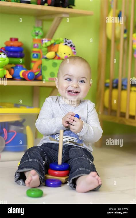A One Year Old Child Playing In His Room Stock Photo Alamy