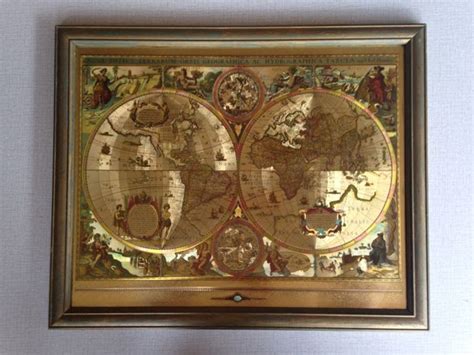 12 h x 18 w x 2 d. "Map of the world" - Gold foil, world map, framed. - Catawiki
