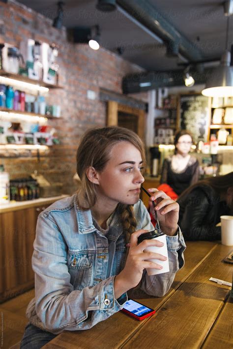 The Girl Is Drinking Coffee Del Colaborador De Stocksy Danil Nevsky Stocksy