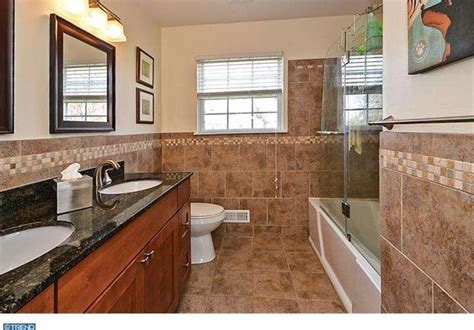 This tile looks nothing like the sales picture. Traditional Master Bathroom with sandstone tile floors ...