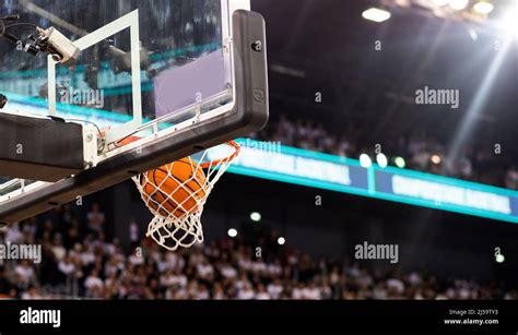 Basketball Game Ball In Hoop Stock Photo Alamy