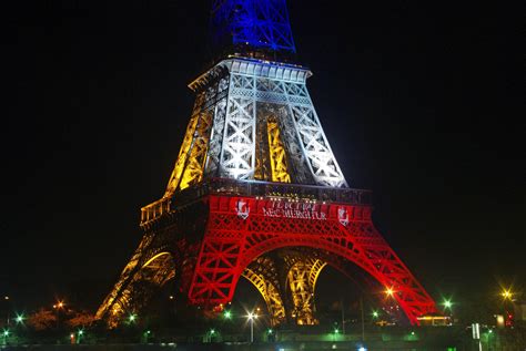Eiffel Tower Lit Up In Blue White Red After The Paris Attacks French
