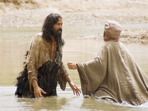 Freebibleimages John The Baptist John Baptises Jesus In The River