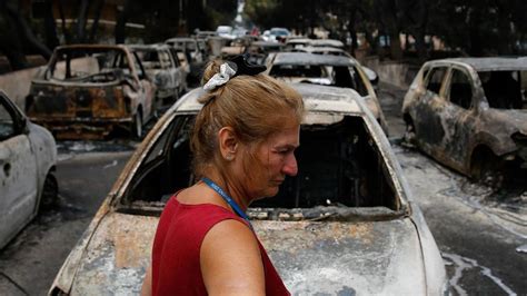 Greece Wildfires Hugging Bodies Found Near Beach As Death Toll Climbs