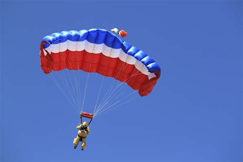 Smokejumpers prepare to parachute into US wildfires