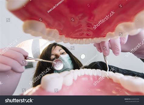 Dentist Examining Patient Teeth Inside Mouth Stock Photo 604055330