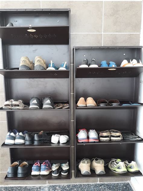 The top might be used as a shelf as well. Wall Mounted Shoe Rack Hyderabad-Metal Shoe Rack Online