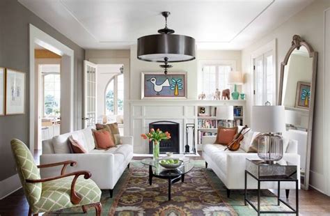 Photo courtesy of ann lowengart photo by: Two small matching sofas define area and unify multiple ...