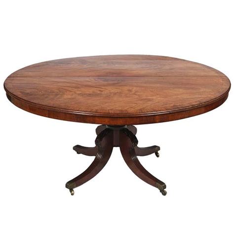 Expanding circular dining tables inspired by the work of robert jupe who made the first expanding circular dining tables in the 1830 s george has created a table where the expansion leaves are stored within the body of the table and rise up automatically as it rotates. Circular Mahogany Expanding Jupe Table at 1stdibs