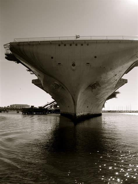 A Large Ship Sitting On Top Of A Body Of Water