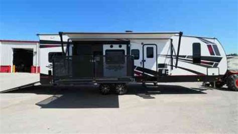2021 Stryker 3212 Travel Trailer Toy Hauler Side Patio Vans Suvs And