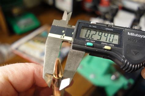 Measuring Loaded Round Mitutoyo Caliper - Panhandle Precision