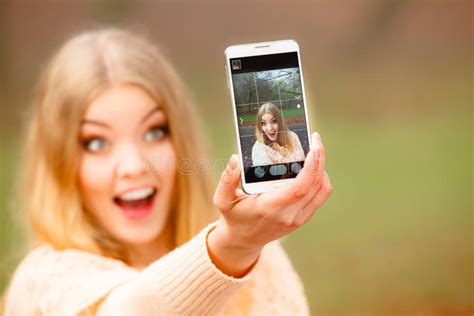 Girl Taking Self Picture With Phone Outdoors Stock Image Image Of Emotional Glad 56866143