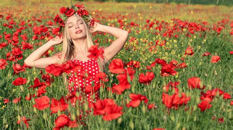Beautiful Girl Model Is Standing In The Middle Of Red Common Poppy