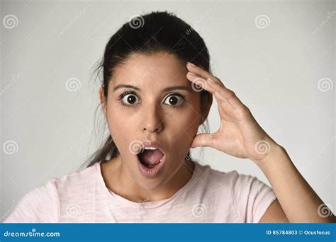 Young Beautiful Surprised Woman Amazed In Shock And Surprise With Mouth Big Opened Stock Image