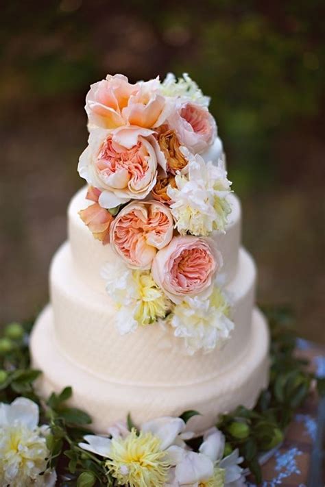 Peach Wedding Cake Covered In Flowers Youandme