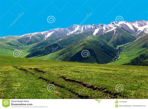 Stunning Views Of The Mountain Range Bright Sky Snowy Ridges And