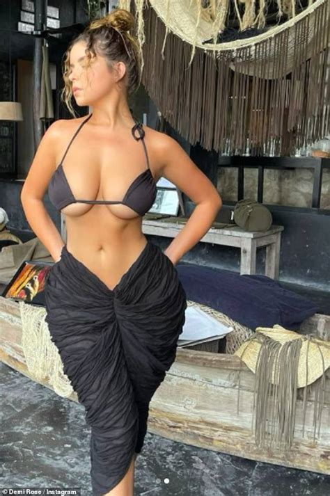 Demi Rose Flaunts Her Ample Assets And Peachy Posterior In A Tropical