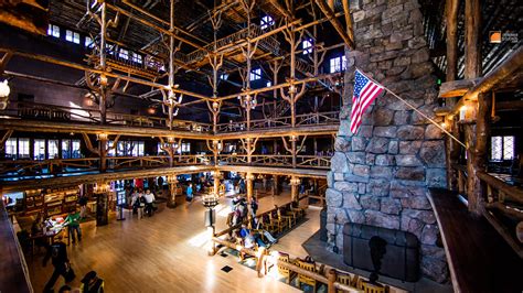 The old faithful inn was designated a national historic landmark in 1987. Old Faithful Inn lobby, Yellowstone National Park, Wyoming ...